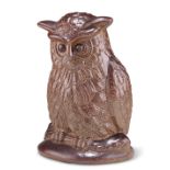 A VICTORIAN SALT-GLAZED STONEWARE MODEL OF AN OWL, perching and with detailed feathers. 20.5cm high