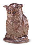 A VICTORIAN SALT-GLAZED STONEWARE MODEL OF AN OWL, perching and with detailed feathers. 20.5cm high
