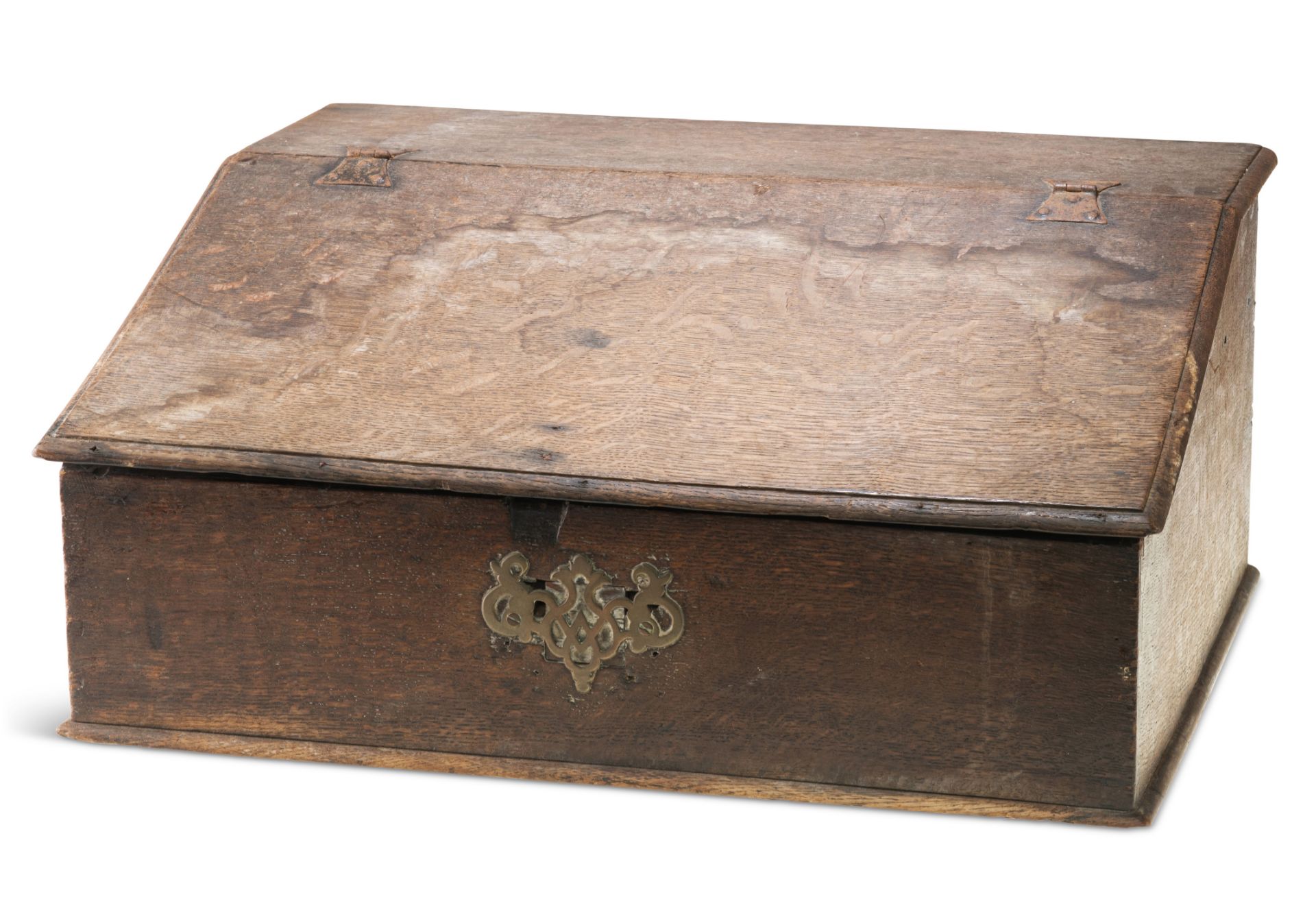 AN OAK SLOPE-FRONT BIBLE BOX, with decorative hinges and later pierced escutcheon, the interior with