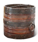 A 19TH CENTURY INDIAN IRON-MOUNTED TEAK GRAIN MEASURE, cylindrical with reeded bands and large