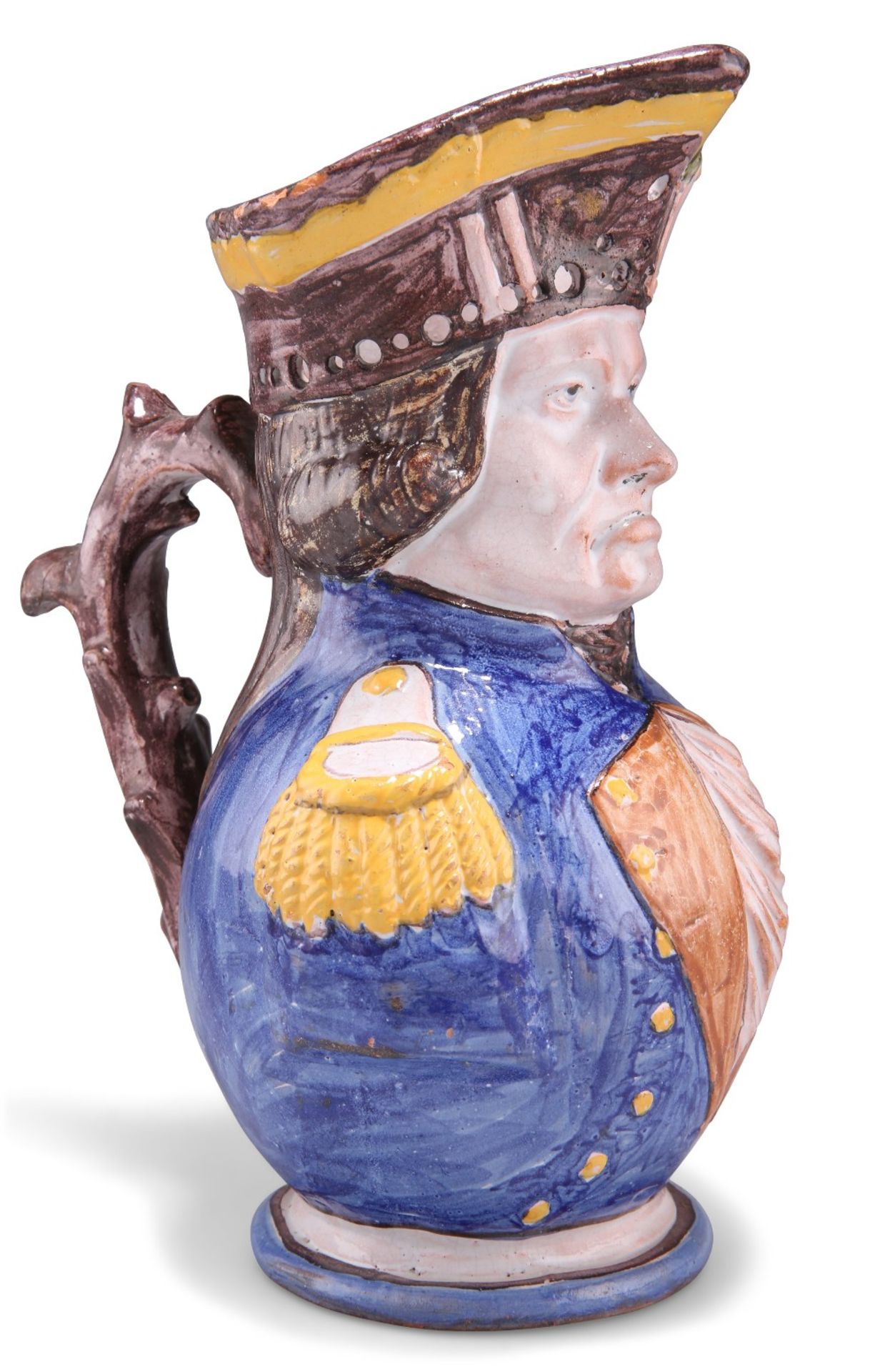 A FRENCH FAØENCE PUZZLE JUG, 19TH CENTURY,ÿmodelled and painted as a stern naval officer, his