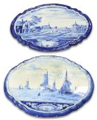 TWO SIMILAR DUTCH DELFT BLUE AND WHITE SHAPED OVAL WALL PLAQUES, PROBABLY MAKKUM, 19TH CENTURY,