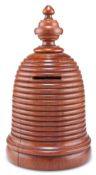 A TREEN MONEY BOX, 19TH CENTURY, in the form of a beehive, with coin aperture. 18cm high