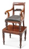AN EARLY VICTORIAN MAHOGANY CHILD'S CHAIR ON STAND, with scrolling arms and leaf-carved tapering