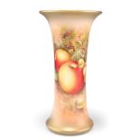A ROYAL WORCESTER PORCELAIN TRUMPET VASE, painted with fruit to a blush and gilt ground, signed E.