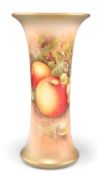 A ROYAL WORCESTER PORCELAIN TRUMPET VASE, painted with fruit to a blush and gilt ground, signed E.