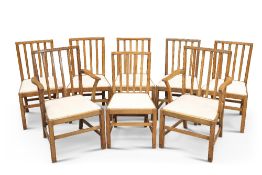 A SET OF EIGHT OAK DINING CHAIRS, ATTRIBUTED TO EDWARD BARNSLEY, including a pair of carvers, with