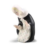 PAOLA BOLOGNA FOR LENCI, A POTTERY FIGURE OF THE MADONNA, in keeling pose with hands raised, wearing