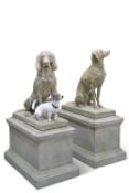 TWO LARGE RECONSTITUTED STONE DOGS, both seated, on rectangular plinths, one (with collar) looking