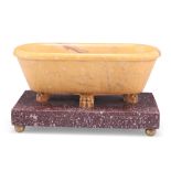 A GRAND TOUR SIENA MARBLE REDUCTION OF A ROMAN BATH, ITALY, CIRCA 1820, on lion paw feet and