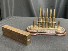 A BULLET MOULD, AND A RIFLE CLIP WITH WITH FIVE ROUNDS