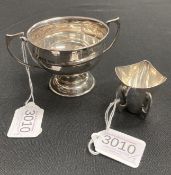 A small silver presentation bowl and vase