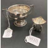 A small silver presentation bowl and vase