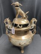A BRASS TRIPOD CENSER AND COVER