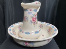 AN EDWARDIAN STYLE WASH JUG AND BOW