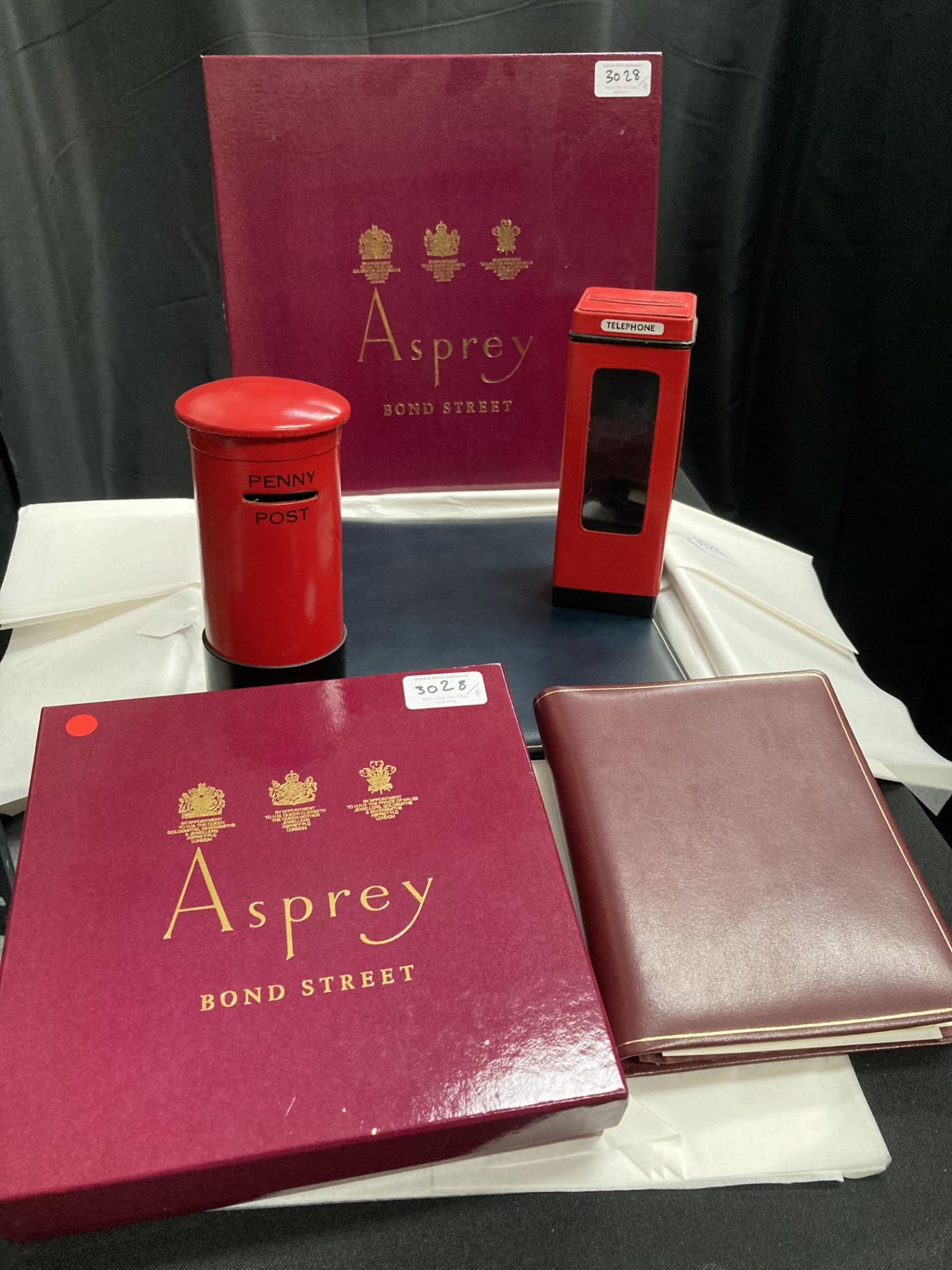 Asprey's leather address book, money box, etc.