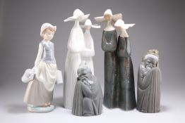 A group of five Lladro figures