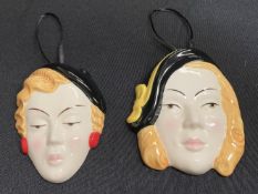 TWO MOORLAND POTTERY FACE MASKS