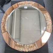 An Art Deco frameless circular mirror