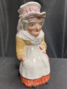 A 19TH CENTURY STAFFORDSHIRE 'JUDY' TOBY JUG