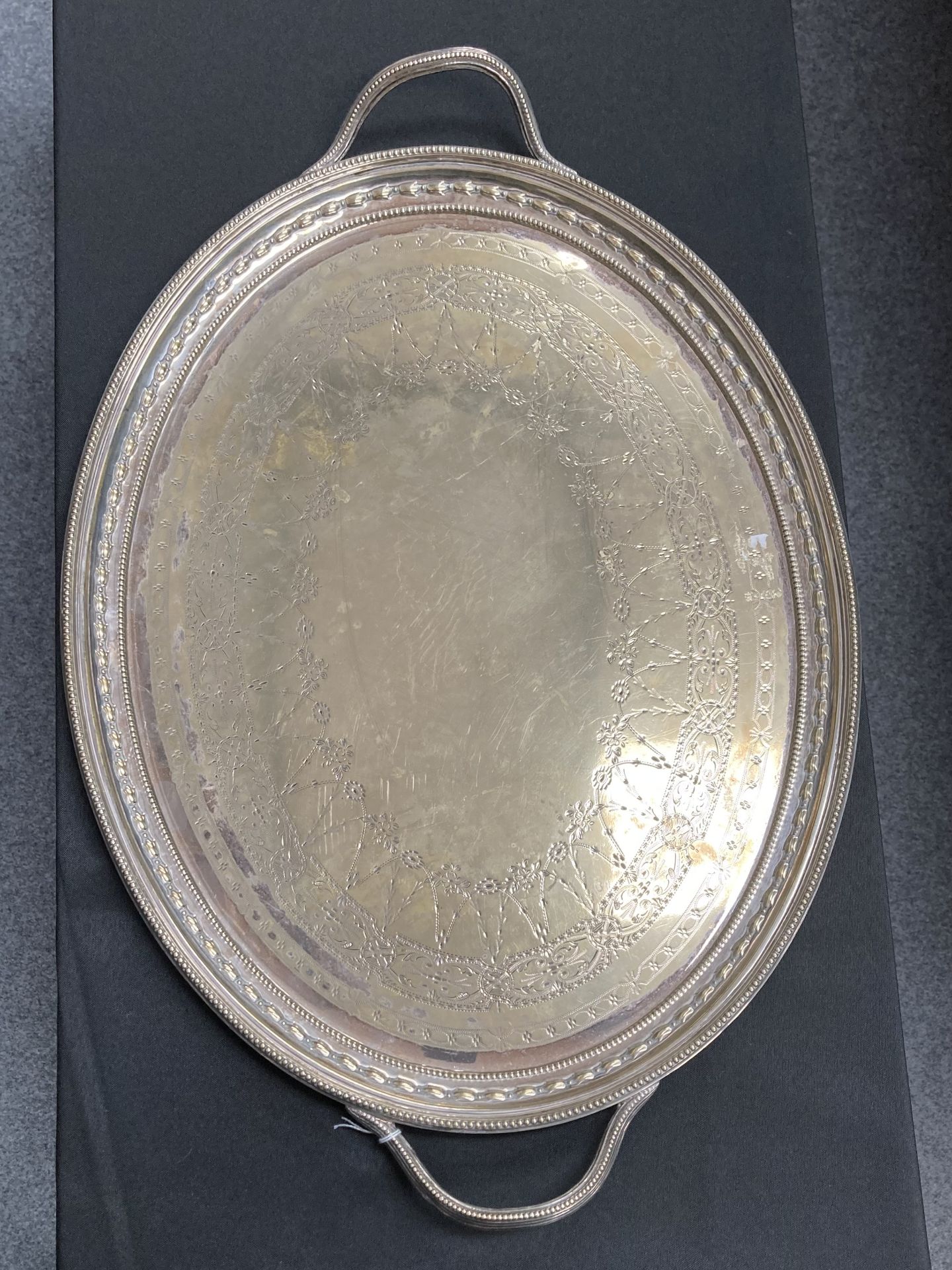 A silver-plated two handled tray