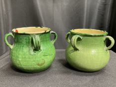 A NEAR PAIR OF 19TH CENTURY FRENCH GREEN-GLAZED VASES