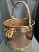 A BRASS AND COPPER COAL BUCKET