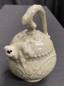 A CHINESE CELADON EWER