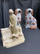 A TURN VIENNA FIGURAL VASE AND A PAIR OF STAFFORDSHIRE SPANIELS