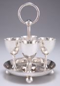 AN EDWARDIAN SILVER-PLATED EGG CRUET