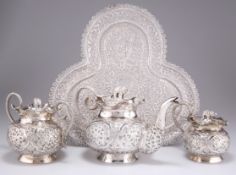 AN INDIAN SILVER THREE-PIECE TEA SERVICE AND TRAY, PROBABLY KASHMIR