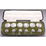 A SET OF LATE VICTORIAN SILVER BUTTONS