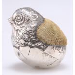 AN EDWARDIAN SILVER NOVELTY PIN CUSHION