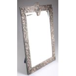 A VERY LARGE EDWARDIAN SILVER-MOUNTED MIRROR