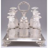 A GEORGE III SILVER EIGHT-BOTTLE CRUET STAND