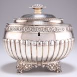 A GEORGE IV SILVER TEA CADDY