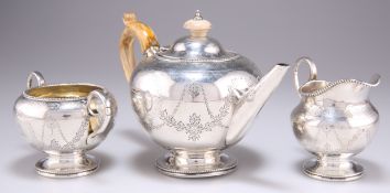 A VICTORIAN SILVER THREE-PIECE BACHELOR'S TEA SERVICE