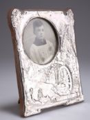 AN ARTS AND CRAFTS SILVER PHOTOGRAPH FRAME