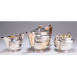 A GEORGE III SILVER THREE-PIECE TEA SERVICE