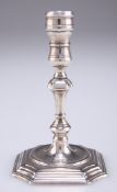 AN EARLY 18TH CENTURY UNMARKED SILVER TAPERSTICK