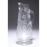 A 19TH CENTURY GLASS JUG, PROBBALY STOURBRIDGE