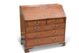 A GEORGE III MAHOGANY SLANT-FRONT BUREAU