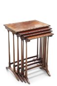 A SET OF EDWARDIAN MAHOGANY QUARTETTO NESTING TABLES