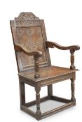 A 17TH CENTURY OAK WAINSCOT CHAIR