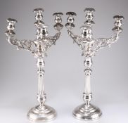 A PAIR OF 19TH CENTURY CONTINENTAL SILVER FOUR-LIGHT CANDELABRA
