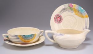 A CLARICE CLIFF BIZARRE 'AUREA' PATTERN LYNTON SOUP BOWL AND SAUCER, AND A MILK JUG AND SAUCER