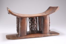 A WEST AFRICAN ASHANTI STOOL OR HEAD REST, LATE 19TH/EARLY 20TH CENTURY