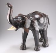 AN EARLY 20TH CENTURY LEATHER MODEL OF AN ELEPHANT