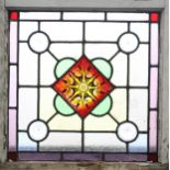 A LEADED STAINED GLASS WINDOW