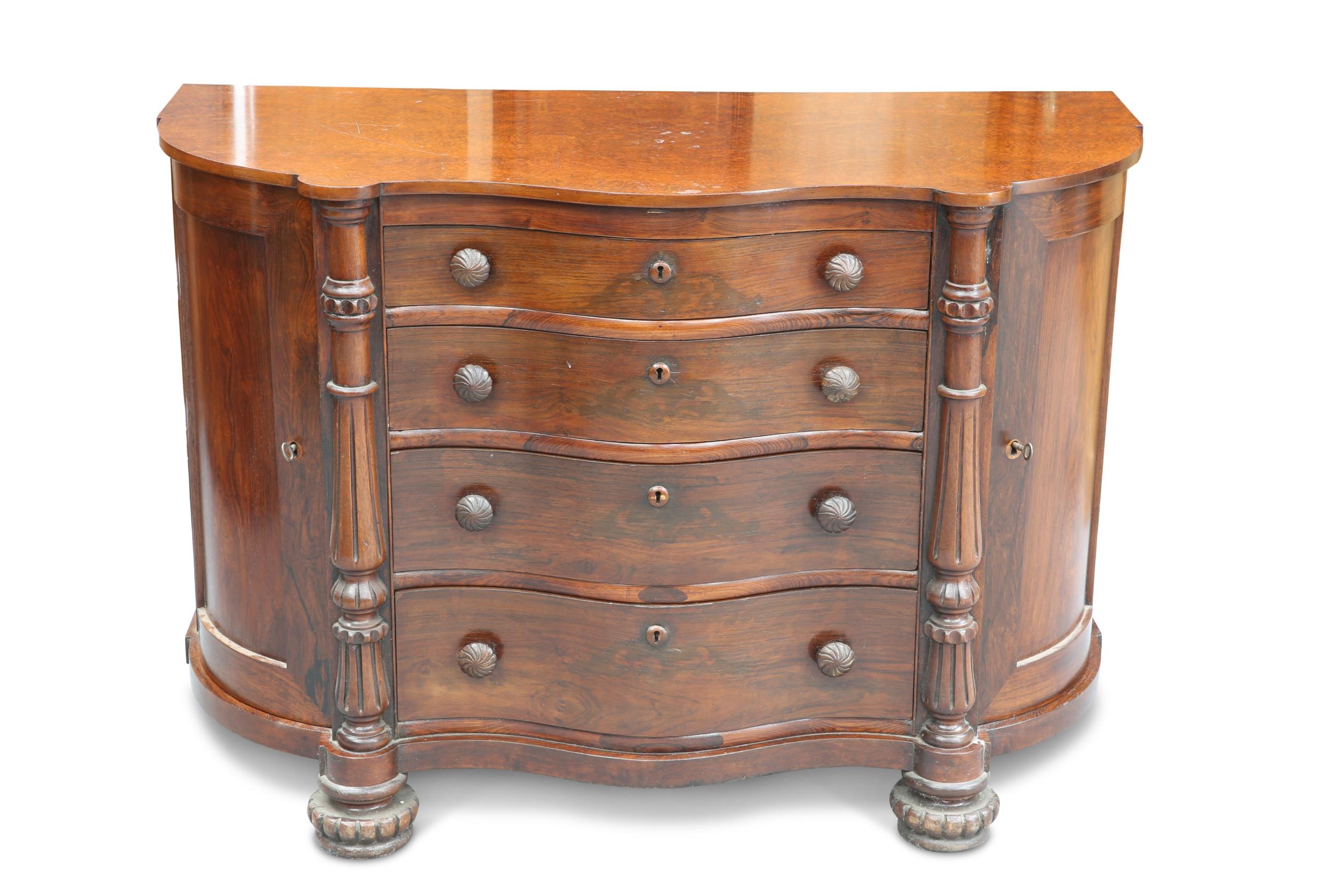 A 19TH CENTURY CONTINENTAL ROSEWOOD COMMODE